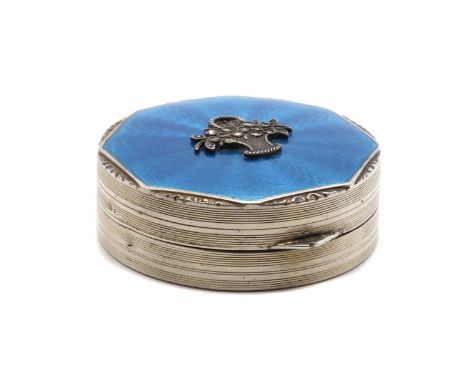 A small Continental compact,marked C&amp;C, London import marks 1927, of circular form, the blue guilloche enamelled lid with