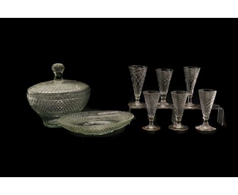 A matched set of six glass ale flutes,18th century, with wrythen fluted bowls and basal knop stems,largest 13cm hightogether 