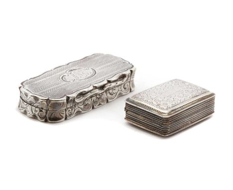 A silver vinaigrette, by Edward Smith, Birmingham 1849, of shaped rectangular form, the engine turned hinged cover with centr