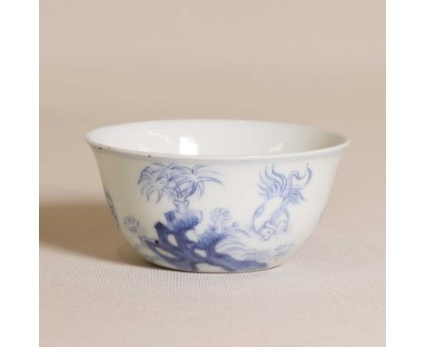A Chinese blue and white teacup, 19th to 20th century, the rounded sides rising from a circular foot, painted with cockerels 