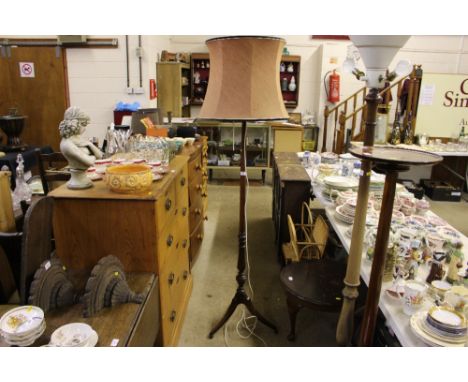 A mahogany standard lamp and shade 