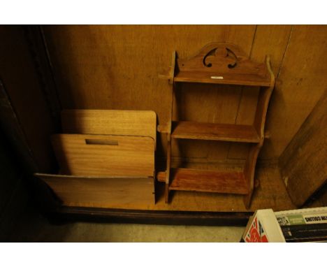 A magazine rack; and a small pine wall shelf 