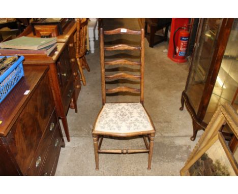 A pair of mahogany and inlaid ladder back bedroom chairs 