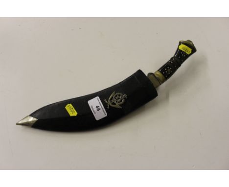 An Indian Kukri knife in scabbard 