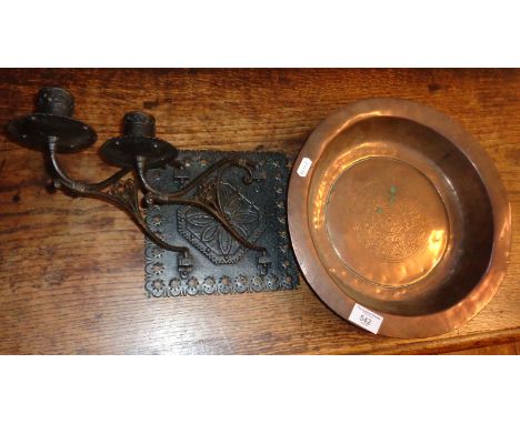 Persian copper alms dish and a hand-forged double sconce wall bracket candlestick