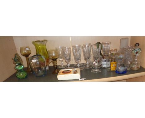 Shelf of assorted glassware