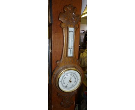 Carved oak banjo barometer