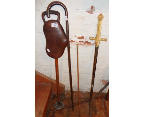Leather saddle-seated shooting stick, an Ardingly College O.T.C. swagger stick, a French ceremonial sword, and three walking 