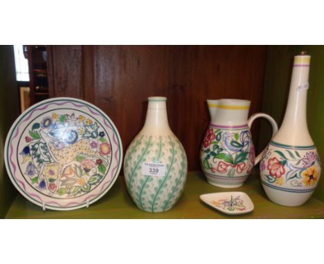 1950s and 1960s Poole Pottery pieces including a finely-painted plate by Gwen Haskins and a Freeform bottle vase (five pieces