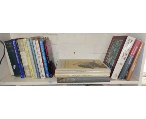 Shelf of books on birds and flowers