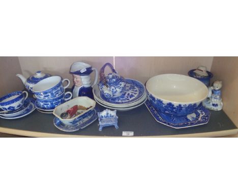 Shelf of assorted blue and white china, inc. Doulton "Willow" bowl and others