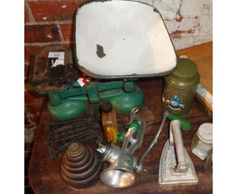 Set of old kitchen scales, a mincer, flat iron, etc.