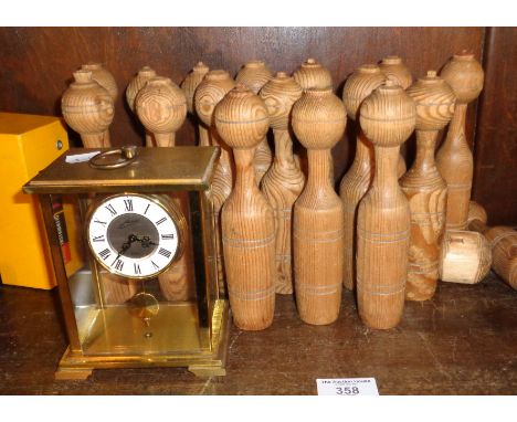 Set of 17 turned pine table skittles and ball, and a vintage Schmid 8-day mantel clock
