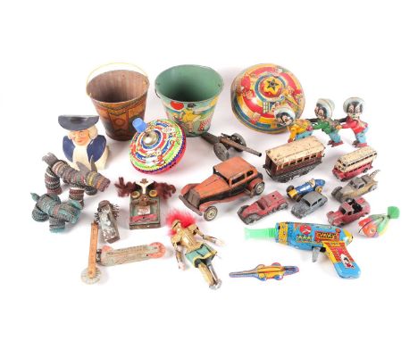 A collection of early-late 20th-century metal toys of various origin. To include various mechanical Chad Valley spinning tops