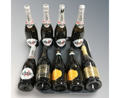A group of alcohol, Asti, Prosecco etc 