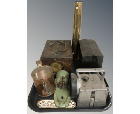 An antique pigeon clock together with a brass shell casing, vintage torch, miniature watering can, etc.