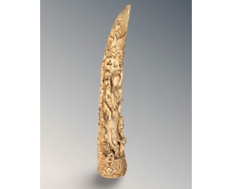 A carved resin tusk