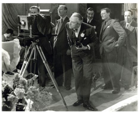 Two Photographs of Cecil Beaton on a Film Set,  vintage gelatin silver prints, anonymous, 1949,  from the set of 'The Small B