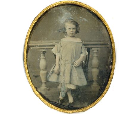 Three Early Photographs, a 1/6th plate oval daguerreotype of a young woman, mounted in velvet and Morocco leather free-standi