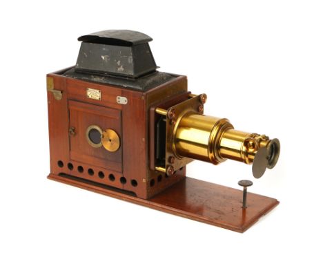 A Newton &amp; Co. Magic Lantern, mahogany body with brass lens, complete with a large selection of various lantern slides, s