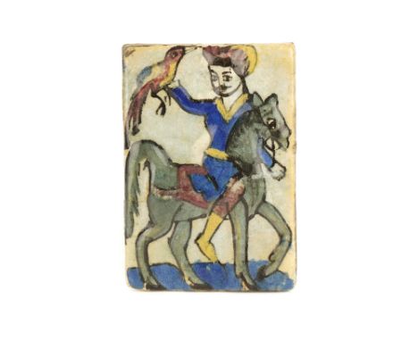 A Persian Ceramic Tile, showing a falconer mounted on horseback, 13cm x 18cm