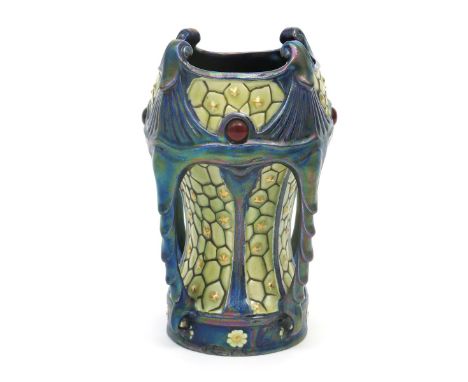 An Art Nouveau pottery vase the design attributed to Zsolnay Pecs,  waisted cylindrical body with swollen bowl and four flute