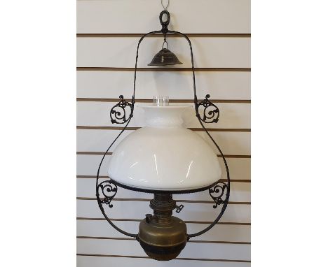 Large antique hanging oil lamp with milk glass shade 