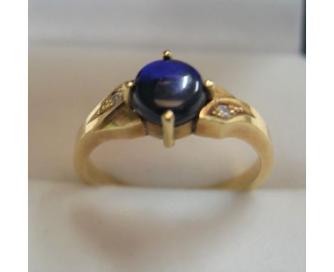 Black opal & diamond yellow gold ring, stamped 750,Gross weight is 3.1 grams            size L 