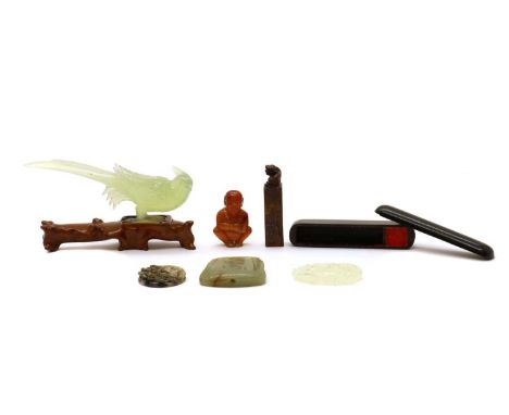 19-20th century, comprising:a hardstone pheasant,14.5cm long, wood stand, a soapstone seal, with a Buddhist lion finial,7cm l