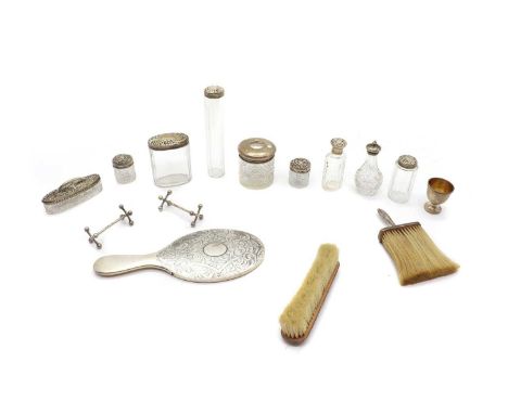 to include a silver hand mirror, London 1927, a silver egg cup, by William Hutton &amp; Sons Ltd, and a pair of silver knife 