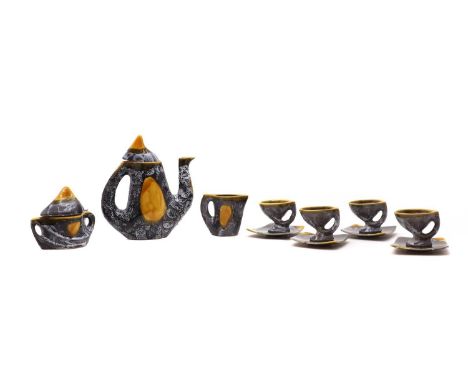 1950s, in grey and mustard comprising a teapot 24.5cm high, a sugar bowl 14cm high, a cream jug 10cm high, 4 teacups 7cm high