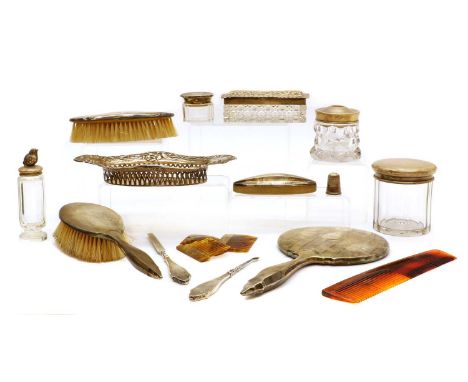comprising three cut glass jars, of circular and rectangular, 8.2cm high, a pierced oval dish, 19cm wide, and a cased set, Bi