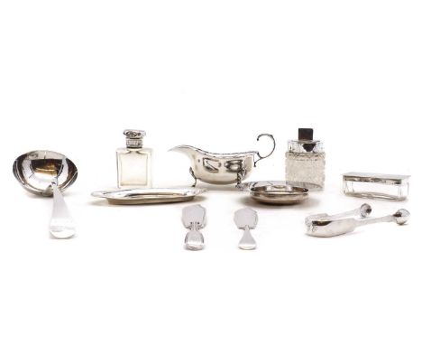 comprising a sauceboat, Birmingham 1932, 7cm wide, a George III sauce ladle, an armada dish, 12cm diameter, a pair of Victori