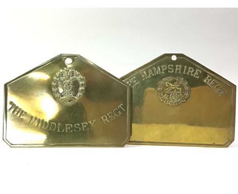 SEVEN REGIMENTAL BED PLATES, including one named example for J. Laurie 10126 of the Argyll and Sutherland Highlanders, six ot