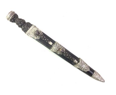 HIGHLAND DIRK, MID 20TH CENTURY with chromed fullered and serated blade over a basket weave grip, the scabbard fitted with en