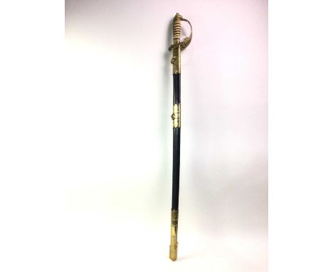 NAVAL OFFICER'S 1827-PATTERN DRESS SWORD, CIRCA 1901-52 the fullered steel blade etched with insignia, over a brass guard and