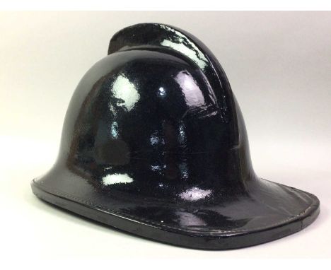 CROMWELL PROTECTION LEATHER FIRE BRIGADE HELMET, POST-WAR, CIRCA 1955 size medium, mounted FB crown and laurel wreath in gilt