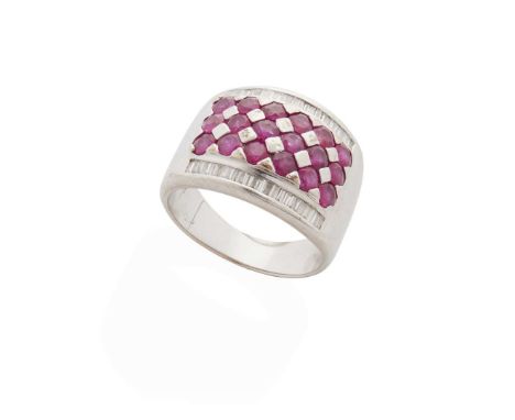  A ruby and diamond dress ring  Pavé-set with three rows of round-cut rubies, between two rows of baguette-cut diamonds, plai