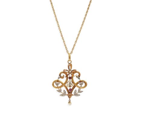  An early 20th century ruby, pearl and diamond pendant necklace  Of open scrolling design, set with seed pearls, small round-
