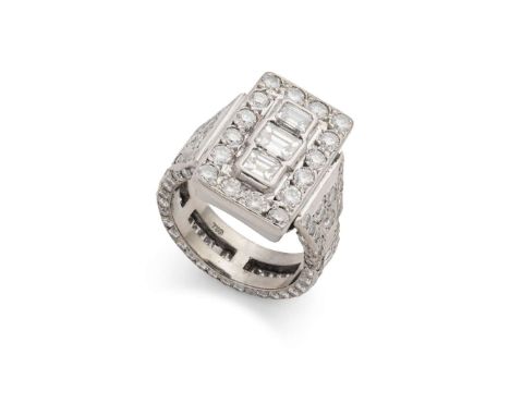  A diamond dress ring  Collet-set with three rectangular step-cut diamonds, in a border of round brilliant-cut diamonds, the 