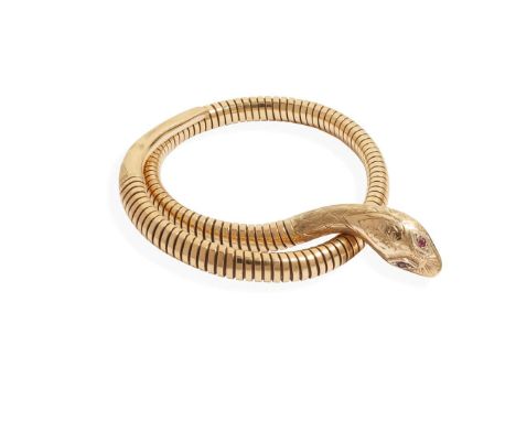  A 9ct gold snake bangle  Modelled as a coiled snake, the steel sprung tubo-flex body terminating in an engraved tail and hea