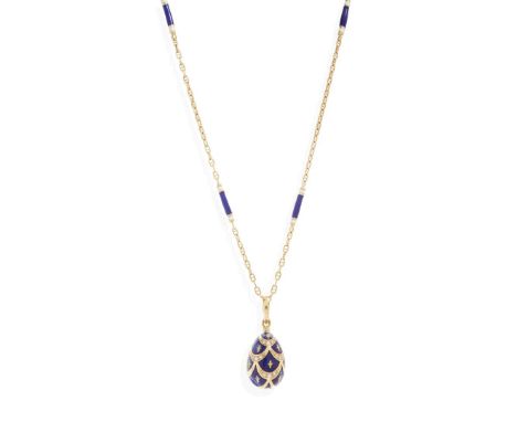  Fabergé: A limited edition enamel and diamond egg pendant and chain  The blue enamel egg with fleur-de-lis and swag detail, 