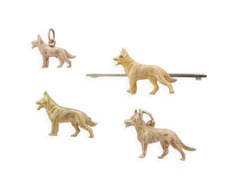  A collection of 'German Shepherd' pendants/brooches  Including two naturalistically modelled 9ct gold pendants, a similar 9c