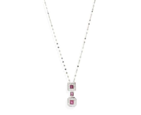  A ruby and diamond pendant necklace  Collet-set with three rectangular step-cut rubies, two in a channel-set border of step-