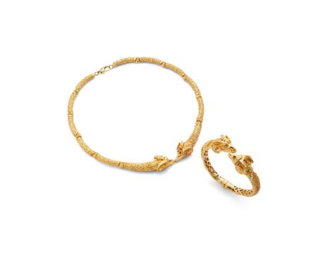  A 'Ram's Head' necklace and matching bangle  The necklace composed of articulated textured links centering on a double rams 