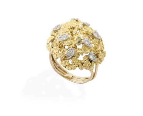  A mid 20th century diamond cocktail ring  Of domed textured design, set at intervals with nine round brilliant-cut diamonds,