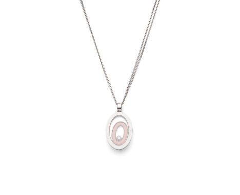  Chopard: A diamond and coral 'Happy Spirit' pendant  The oval glazed panel holding a ‘floating’ round brilliant-cut diamond 