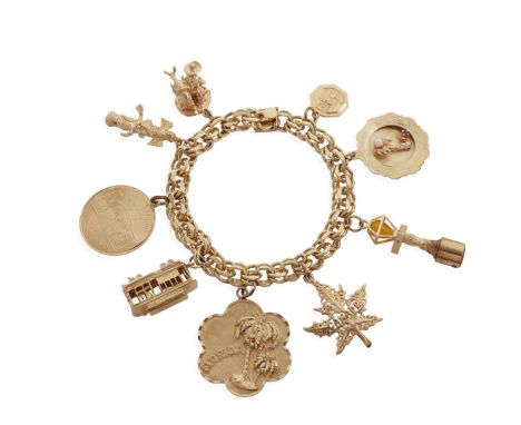  An American themed charm bracelet  Composed of fancy curb-style links, stamped 18k; suspending various charms including a tr