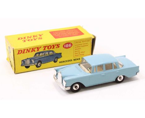 Dinky Toys No. 186 Mercedes Benz 220SE comprising light blue body with off-white interior and spun hubs, in the original all-