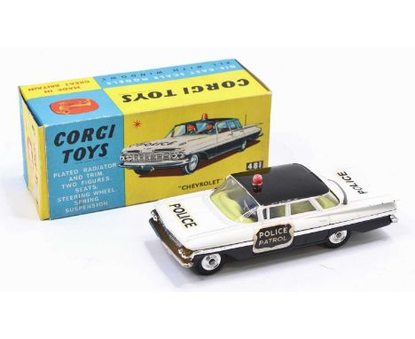 A Corgi Toys No. 481 Chevrolet Police Car, black and white body with black roof and red roof light, with Police Patrol sticke